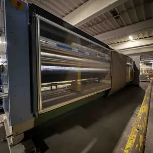 Stroj na automatické narovnávání útku. MAHLO Orthomat RFMC-10A
