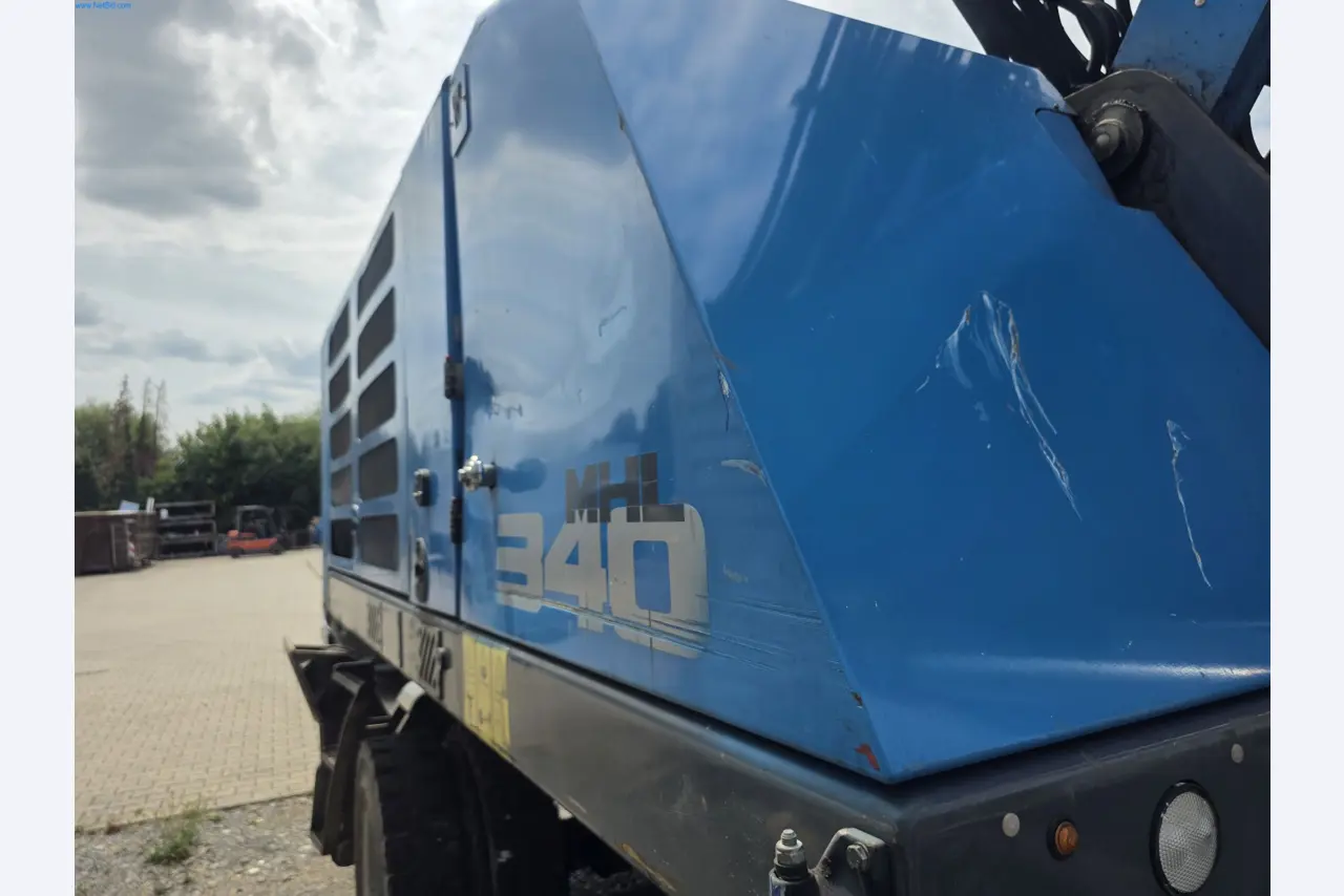 Trucks, Mobile Crushers, Loading Excavators, Mini Excavators-10