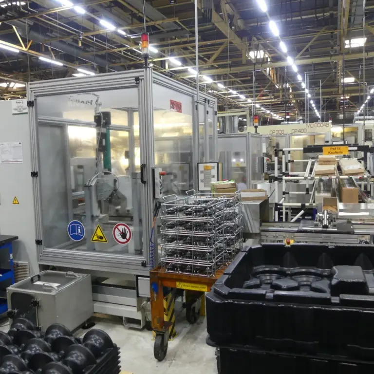 Linha de embalagem Krüger Industrieautomation Montagestation BMT6