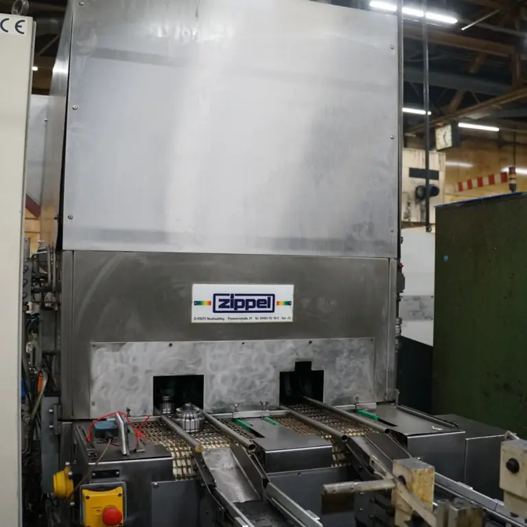 Pass-through washing machine with Zippel