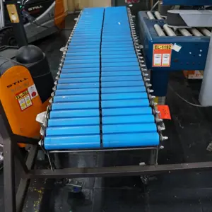 Scissor roller conveyor