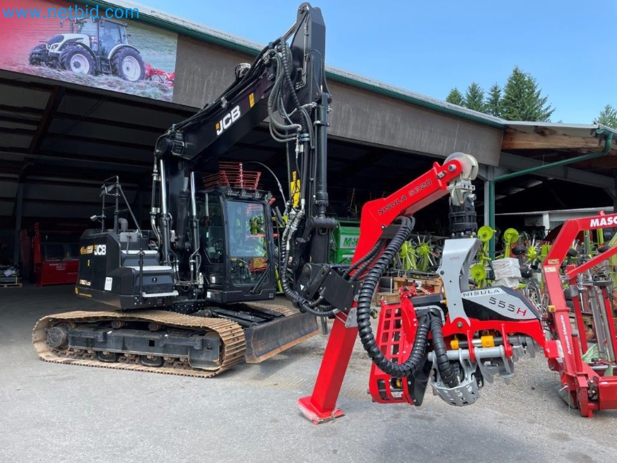 JCB excavator and Nisula forestry harvester-1
