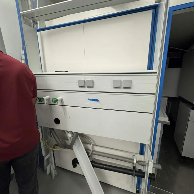 Two-sided media wall