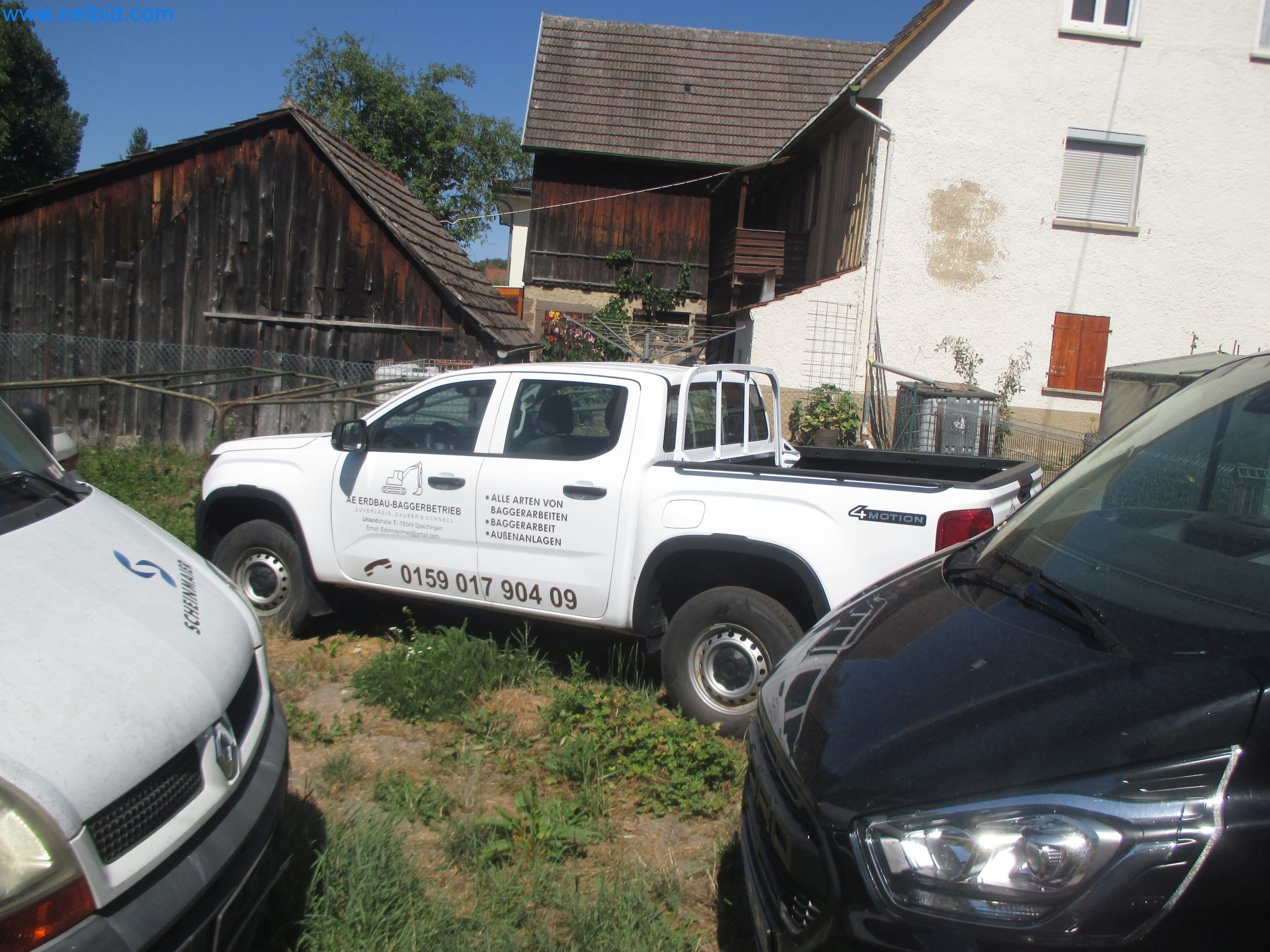 4 vehicles and a compact excavator-2