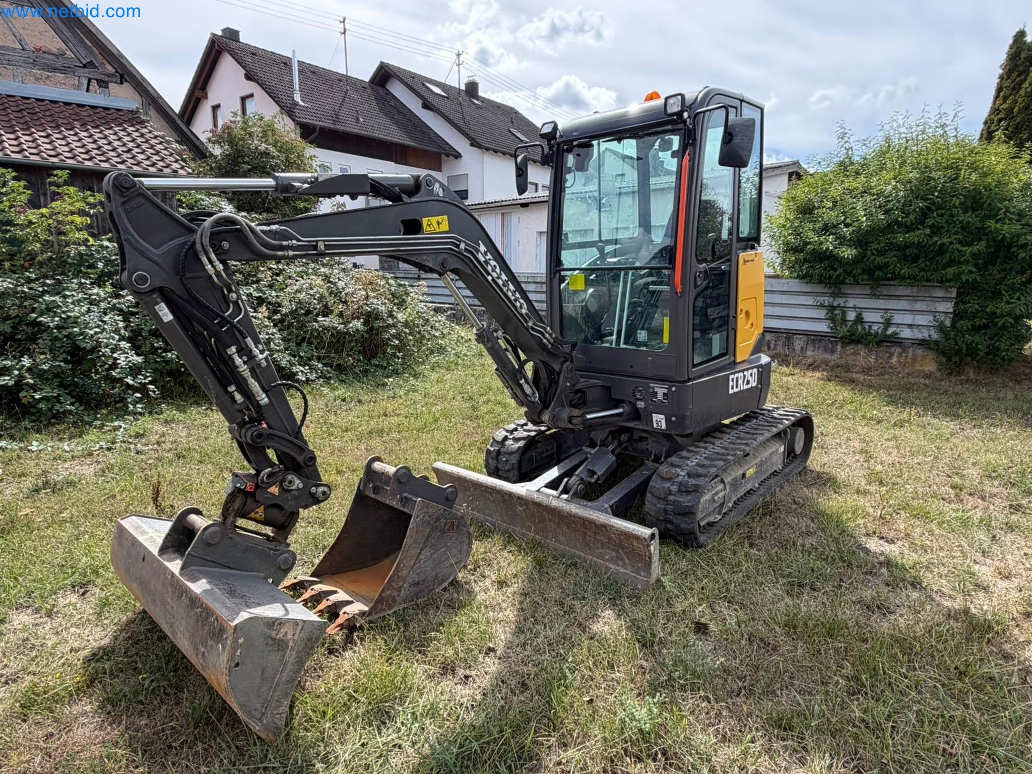 4 vehicles and a compact excavator-1
