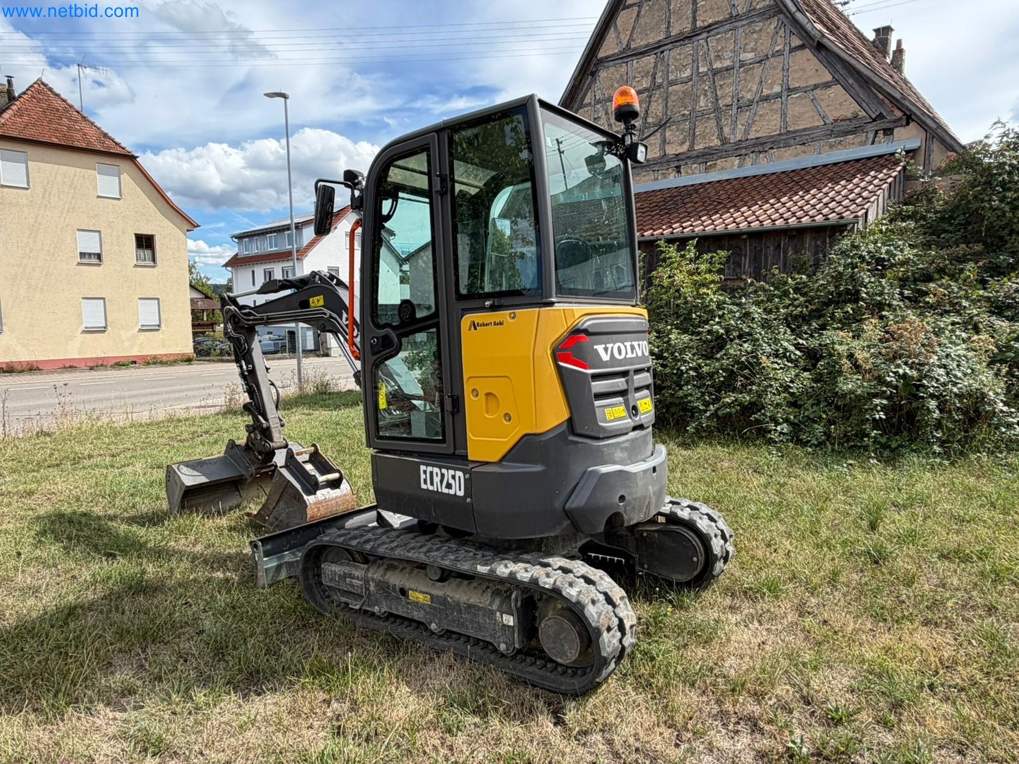4 vehicles and a compact excavator-2