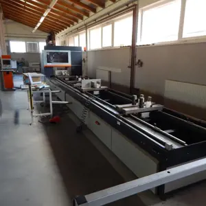 Profile machining centre with 2 Advanced multiple light beam safety devices  Elumatec SBZ 140