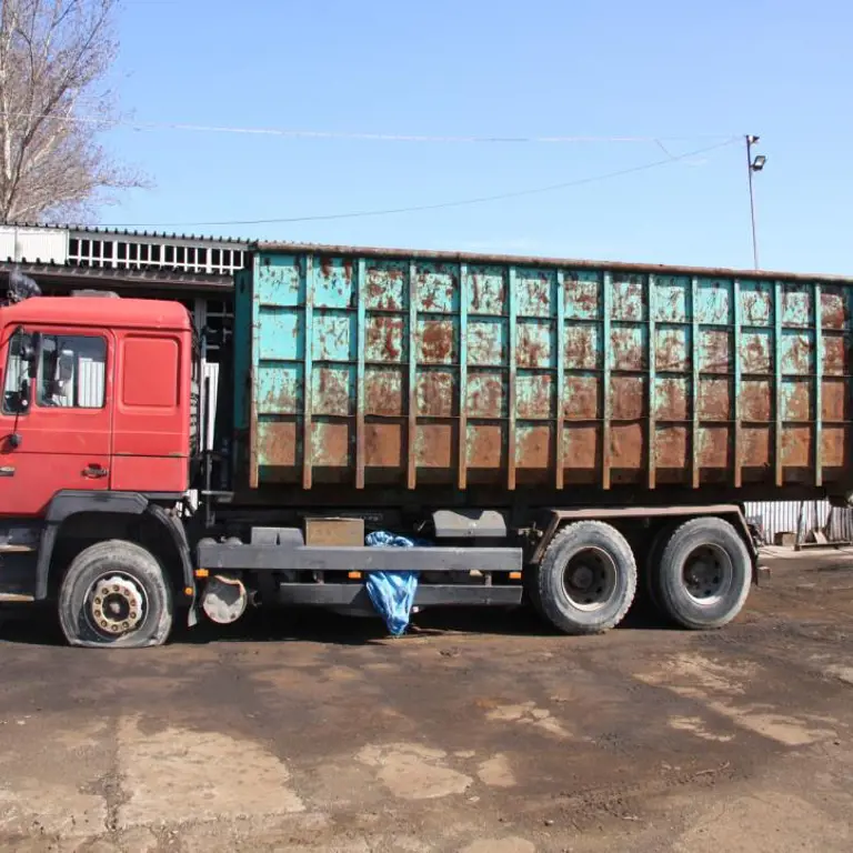 Camion à benne basculante MAN 26.402