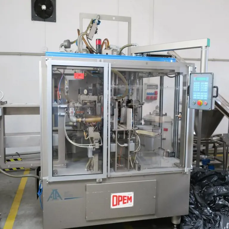 Machine for packing several sachets into packages OPEM APS